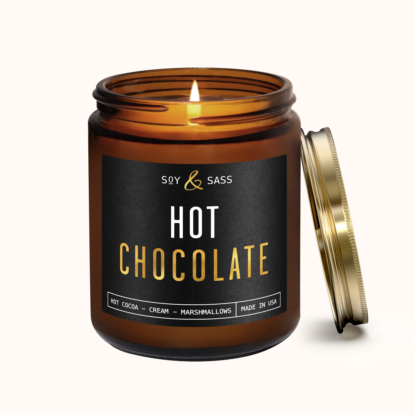 Candle in a jar labeled 'Hot Chocolate' on a white background